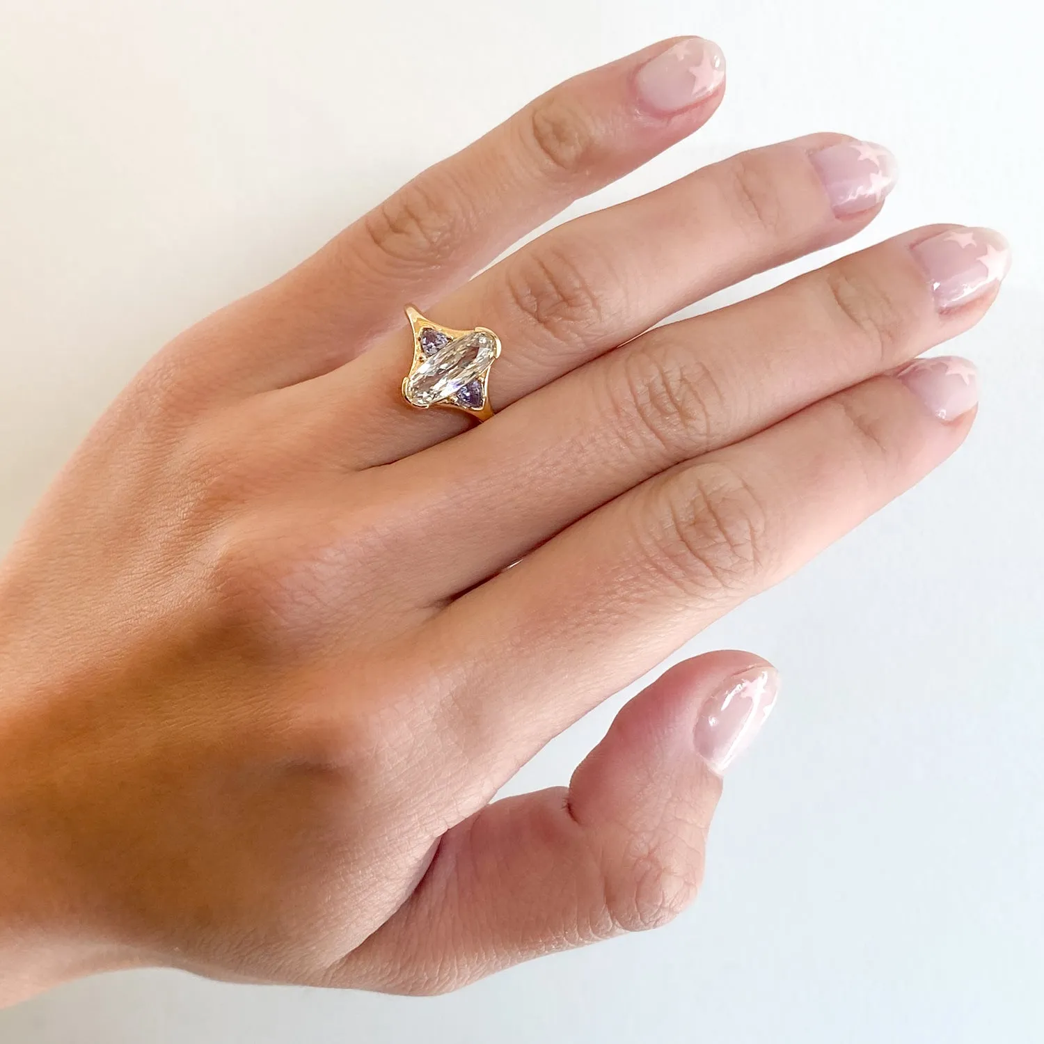 Elongated Oval & Purple Spinel Trillion Ring