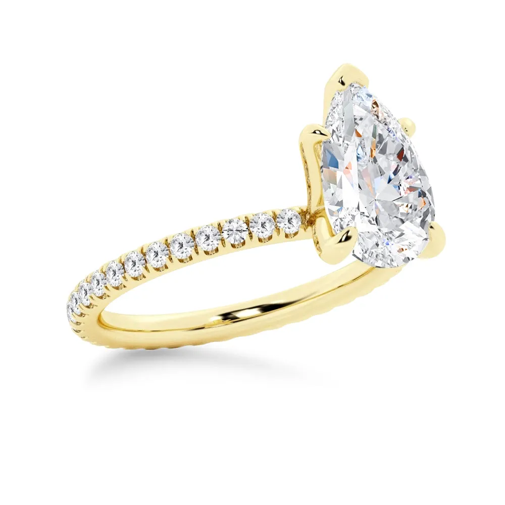 Pear Shaped Moissanite Engagement Ring With Eternity Pave Band